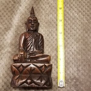 Hand carved Buddhist statue